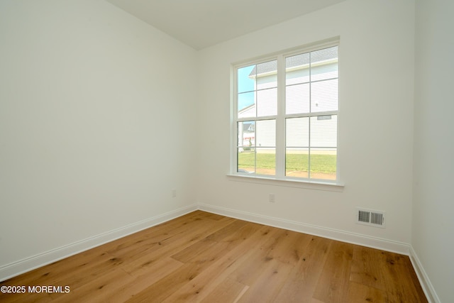 15 Ashlynn Ct, Manalapan, NJ 07726 - unfurnished room with light wood finished floors and plenty of natural light