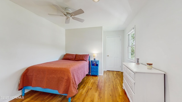 26 Appomattox Dr, Manalapan, NJ 07726 - bedroom with light wood finished floors and a ceiling fan