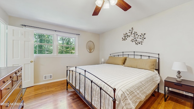 26 Appomattox Dr, Manalapan, NJ 07726 - bedroom with light wood-style floors and ceiling fan