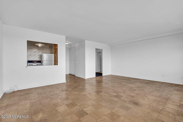510 Deal Lake Dr Unit 8F, Asbury Park, NJ 07712 - empty room featuring baseboards