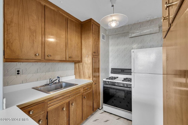 510 Deal Lake Dr Unit 8F, Asbury Park, NJ 07712 - kitchen featuring white appliances, brown cabinets, light countertops, and decorative backsplash