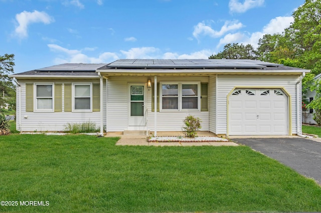 81 Falmouth Ave Unit 72, Whiting, NJ 08759 - ranch-style home with an attached garage, a front lawn, asphalt driveway, and roof mounted solar panels