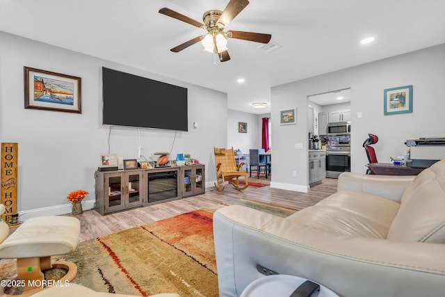 81 Falmouth Ave Unit 72, Whiting, NJ 08759 - living room with wood finished floors, ceiling fan, and recessed lighting
