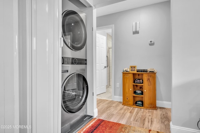 81 Falmouth Ave Unit 72, Whiting, NJ 08759 - laundry area featuring stacked washer / drying machine and wood finished floors