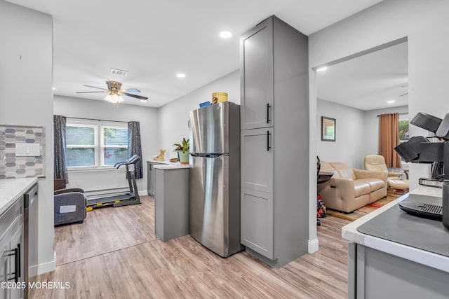 81 Falmouth Ave Unit 72, Whiting, NJ 08759 - kitchen with freestanding refrigerator, gray cabinetry, light wood-style flooring, healthy amount of natural light, and recessed lighting