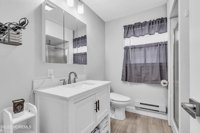 81 Falmouth Ave Unit 72, Whiting, NJ 08759 - bathroom featuring a baseboard radiator, a stall shower, and vanity