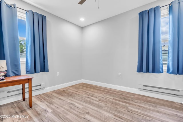 81 Falmouth Ave Unit 72, Whiting, NJ 08759 - spare room with a baseboard heating unit, ceiling fan, light wood-style floors, and recessed lighting