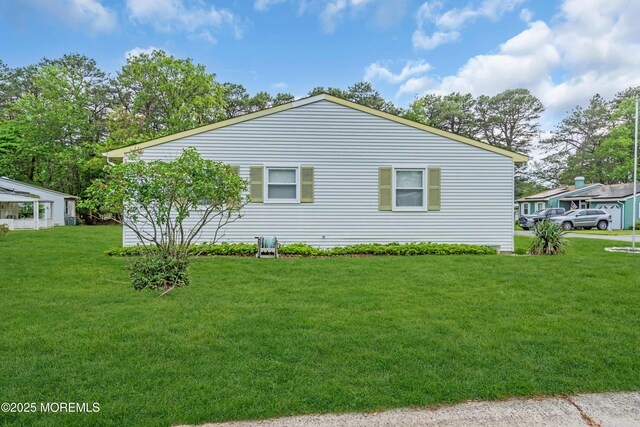 81 Falmouth Ave Unit 72, Whiting, NJ 08759 - view of property exterior featuring a lawn