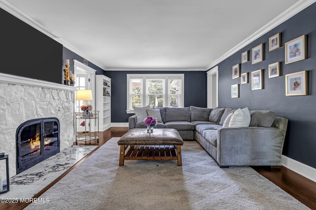 6 Buttonwood Dr, Shrewsbury Boro, NJ 07702 - living room featuring ornamental molding, a fireplace, wood finished floors, and built in shelves