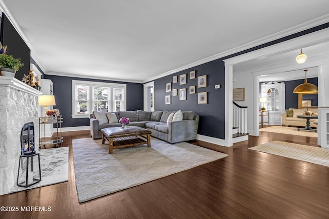 6 Buttonwood Dr, Shrewsbury Boro, NJ 07702 - living room featuring crown molding, wood finished floors, a fireplace, and stairs