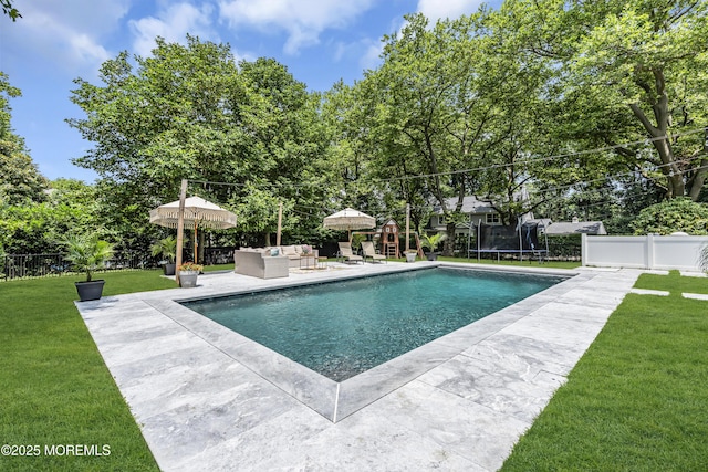 6 Buttonwood Dr, Shrewsbury Boro, NJ 07702 - view of swimming pool featuring a trampoline, outdoor lounge area, a patio area, a fenced backyard, and view of wooded area