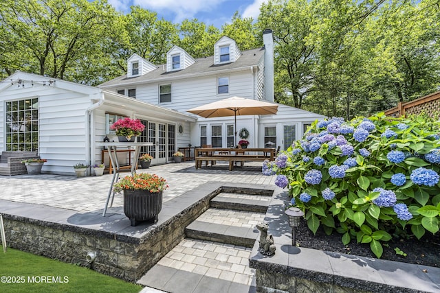 6 Buttonwood Dr, Shrewsbury Boro, NJ 07702 - back of house featuring french doors, a patio, a chimney, and a wooden deck