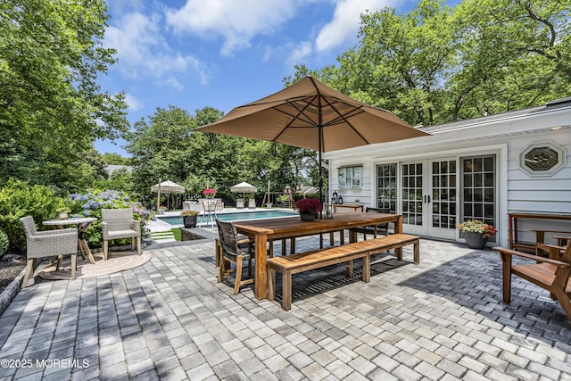 6 Buttonwood Dr, Shrewsbury Boro, NJ 07702 - view of patio with french doors, an outdoor pool, and outdoor dining area