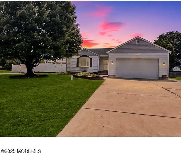 23 Norlaine Dr, Cookstown, NJ 08511 - ranch-style house featuring driveway, an attached garage, and a front yard