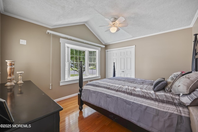 23 Norlaine Dr, Cookstown, NJ 08511 - bedroom with a textured ceiling, wood finished floors, vaulted ceiling, a ceiling fan, and ornamental molding