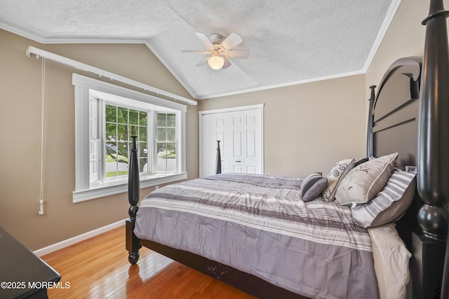 23 Norlaine Dr, Cookstown, NJ 08511 - bedroom with a textured ceiling, vaulted ceiling, wood finished floors, crown molding, and ceiling fan