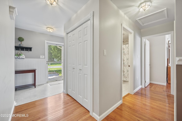 23 Norlaine Dr, Cookstown, NJ 08511 - hall featuring wood finished floors, attic access, and wainscoting