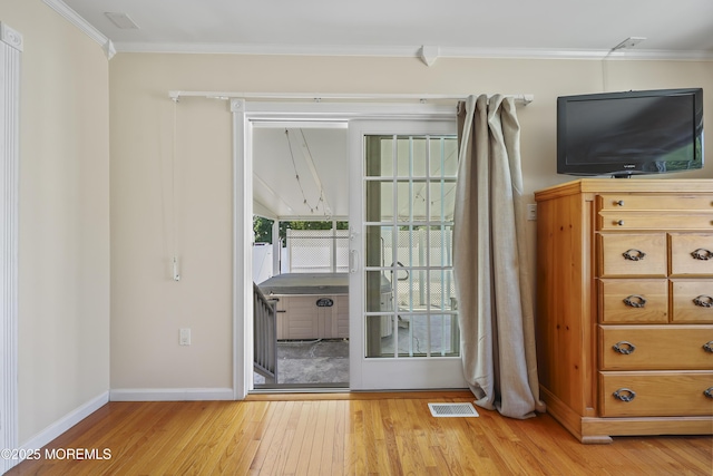 23 Norlaine Dr, Cookstown, NJ 08511 - doorway to outside with wood finished floors and crown molding