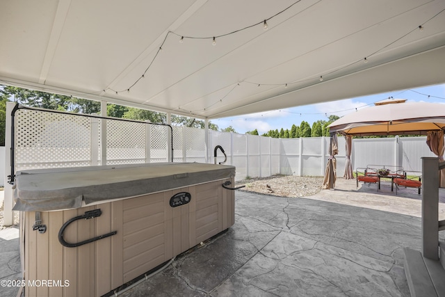 23 Norlaine Dr, Cookstown, NJ 08511 - fenced backyard with a gazebo, a hot tub, and a patio area