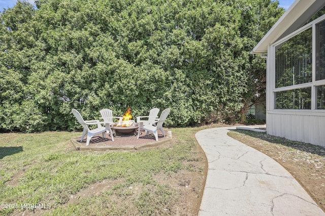 23 Norlaine Dr, Cookstown, NJ 08511 - view of grassy yard with an outdoor fire pit