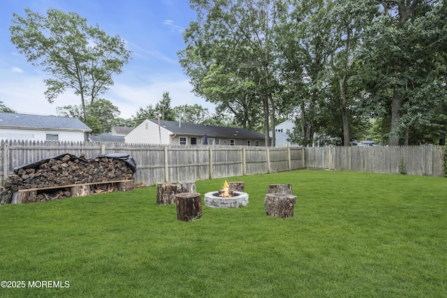 235 Willow Ln, Forked River, NJ 08731 - fenced backyard with a fire pit