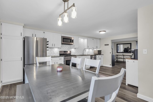 235 Willow Ln, Forked River, NJ 08731 - dining room with dark wood-style floors