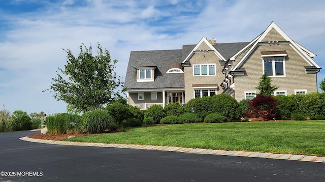 47 Paag Cir, Little Silver, NJ 07739 - shingle-style home featuring a front yard, roof with shingles, and a chimney