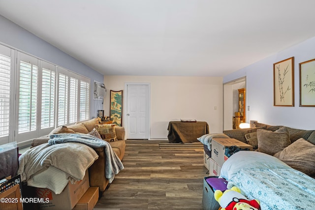 207 Lloyd Rd, Matawan, NJ 07747 - living room with dark wood-style flooring and an AC wall unit