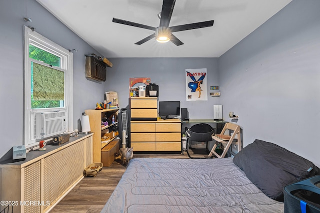 207 Lloyd Rd, Matawan, NJ 07747 - bedroom featuring wood finished floors, cooling unit, a desk, ceiling fan, and a wall mounted AC