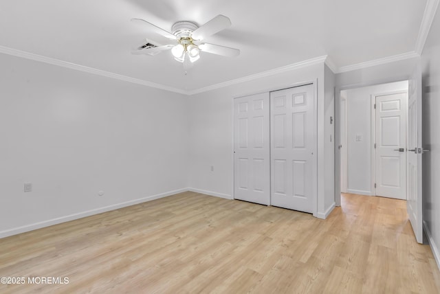 404 Picardy Ct Unit A, Lakewood, NJ 08701 - unfurnished bedroom featuring light wood-type flooring, ornamental molding, a closet, and ceiling fan