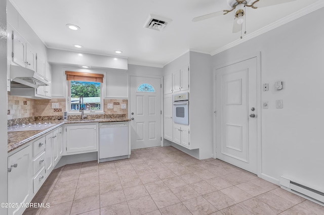 404 Picardy Ct Unit A, Lakewood, NJ 08701 - kitchen with white appliances, under cabinet range hood, baseboard heating, white cabinets, and crown molding