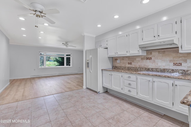 404 Picardy Ct Unit A, Lakewood, NJ 08701 - kitchen featuring under cabinet range hood, white refrigerator with ice dispenser, a baseboard radiator, ceiling fan, and ornamental molding
