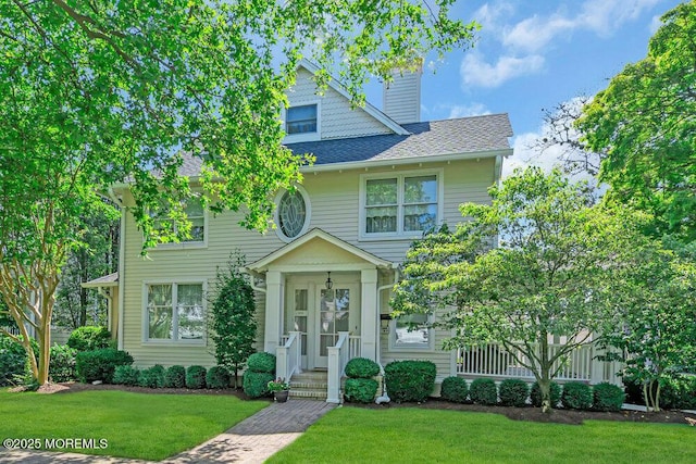 1905 3rd Ave, Spring Lake, NJ 07762 - view of front of property featuring a front lawn, a chimney, and a shingled roof