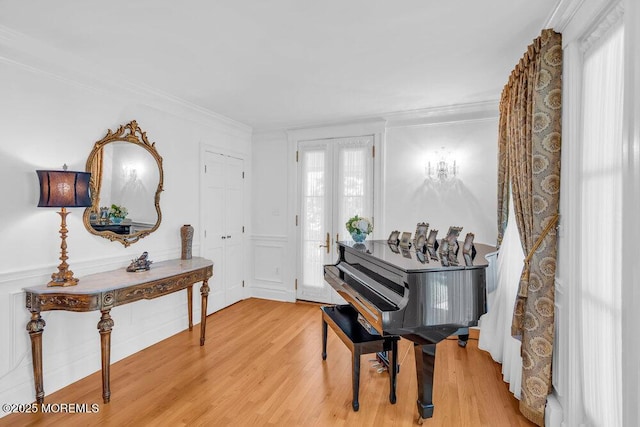 1905 3rd Ave, Spring Lake, NJ 07762 - entryway featuring crown molding, wood finished floors, and a decorative wall