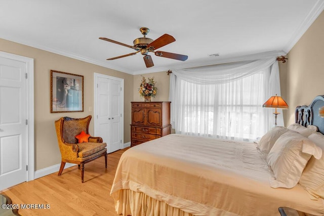 1905 3rd Ave, Spring Lake, NJ 07762 - bedroom featuring crown molding, light wood-style floors, a ceiling fan, and a closet