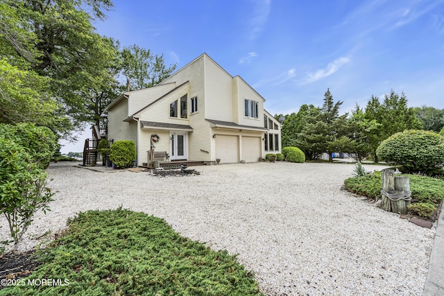 35 Tahoe Ln, Stafford, NJ 08050 - view of front of property featuring an attached garage and gravel driveway