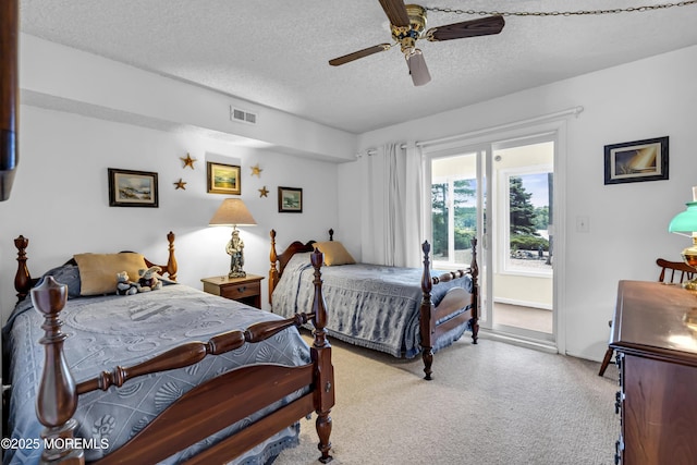 35 Tahoe Ln, Stafford, NJ 08050 - carpeted bedroom with access to exterior, a textured ceiling, and a ceiling fan