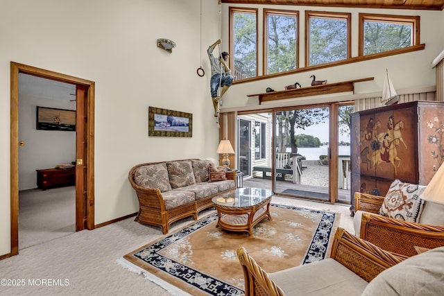 35 Tahoe Ln, Stafford, NJ 08050 - living room with carpet, a high ceiling, a water view, and plenty of natural light