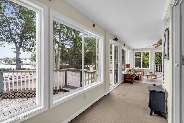 35 Tahoe Ln, Stafford, NJ 08050 - sunroom / solarium featuring healthy amount of natural light, carpet, and a deck with water view