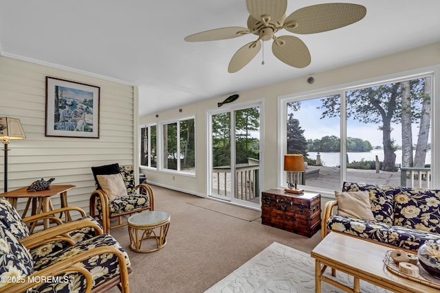 35 Tahoe Ln, Stafford, NJ 08050 - sunroom with carpet, a water view, and wood walls