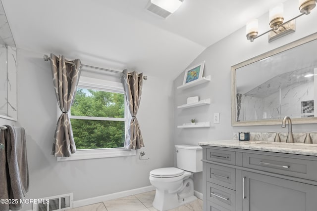243 Donald Ave, Rahway, NJ 07065 - bathroom featuring vaulted ceiling, marble finish flooring, vanity, and a marble finish shower