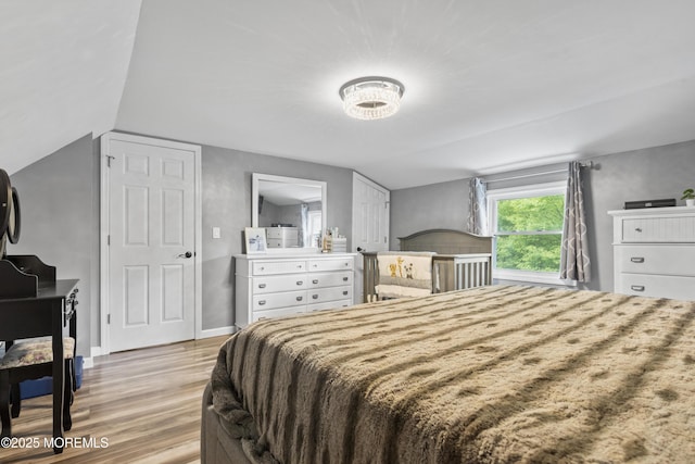243 Donald Ave, Rahway, NJ 07065 - bedroom with light wood-type flooring and lofted ceiling
