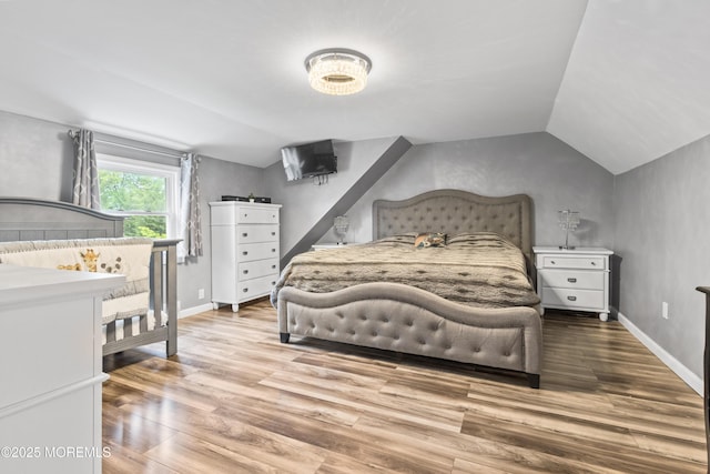 243 Donald Ave, Rahway, NJ 07065 - bedroom with vaulted ceiling and wood finished floors