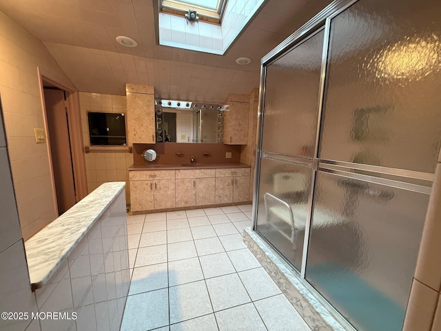34 Woodbrook Cir, Westfield, NJ 07090 - full bathroom with a skylight, a shower stall, and tile patterned floors