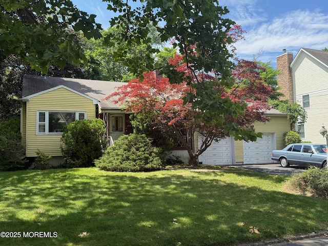 34 Woodbrook Cir, Westfield, NJ 07090 - view of front of property featuring a front lawn and a garage