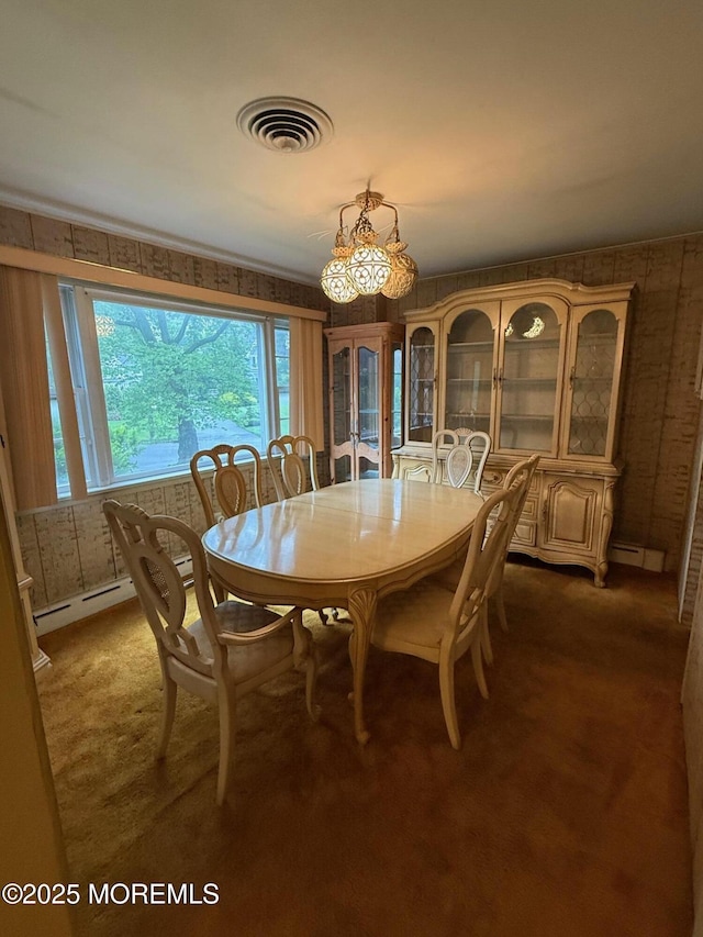 34 Woodbrook Cir, Westfield, NJ 07090 - dining room with baseboard heating, a chandelier, and dark colored carpet