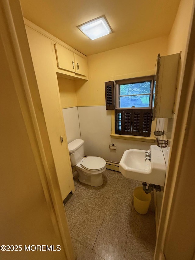 34 Woodbrook Cir, Westfield, NJ 07090 - bathroom featuring a baseboard radiator and tile patterned floors