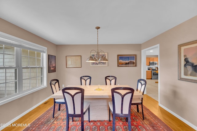 12 Diane Dr, Brick, NJ 08724 - dining space with a chandelier and wood finished floors
