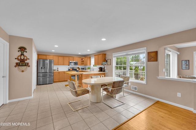 12 Diane Dr, Brick, NJ 08724 - dining room with recessed lighting and light tile patterned floors