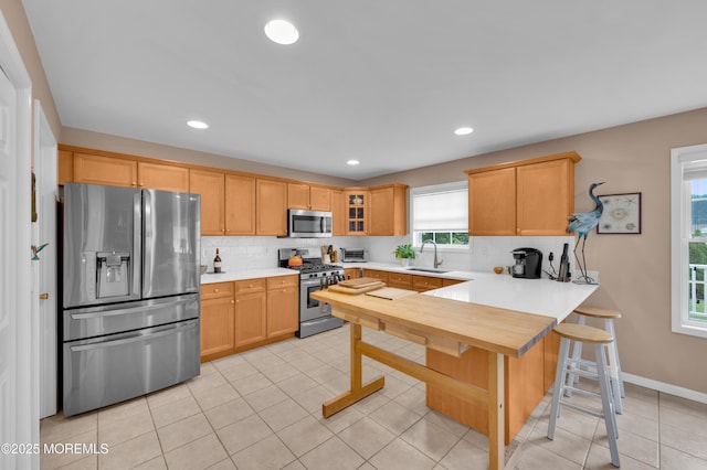 12 Diane Dr, Brick, NJ 08724 - kitchen with stainless steel appliances, backsplash, light countertops, and recessed lighting